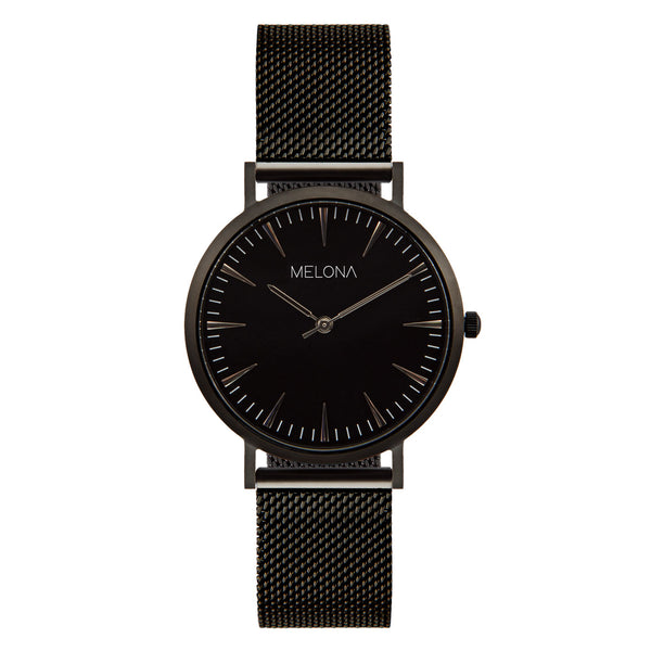 Sofisticado reloj de mujer con correa de malla negra y elegante esfera negra de la marca de joyería española Melona. Colección ALMA MESH