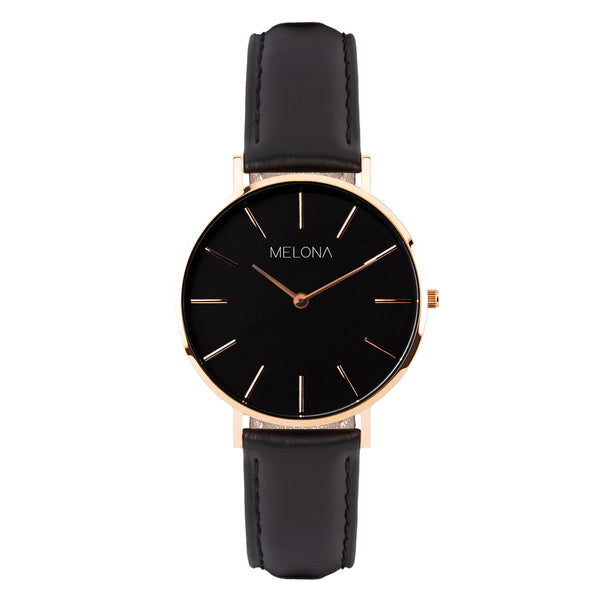 Reloj minimalista negro de mujer con correa de cuero genuino y detalles dorados de la marca de accesorios española Melona de colección Mandala Touch