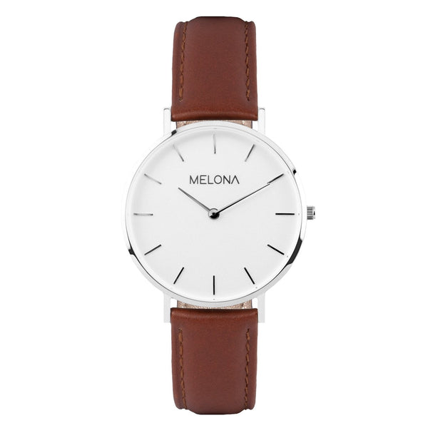 Reloj minimalista de mujer con correa de cuero genuino marrón y esfera blanca de la marca de joyería española Melona. Colección Mandala Touch