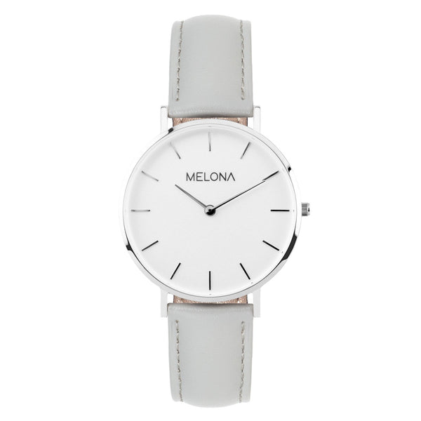 Reloj minimalista gris de mujer con correa de cuero genuino y detalles plateados de la marca de joyería española Melona de Colección Mandala Touch