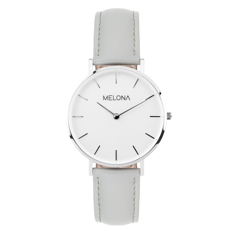 Reloj minimalista gris de mujer con correa de cuero genuino y detalles plateados de la marca de joyería española Melona de Colección Mandala Touch