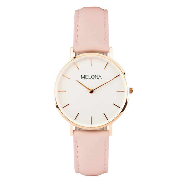 Delicado reloj de mujer con correa de cuero genuino rosa, esfera blanca y detalles dorados de la marca de joyería española Melona de colección Mandala Touch