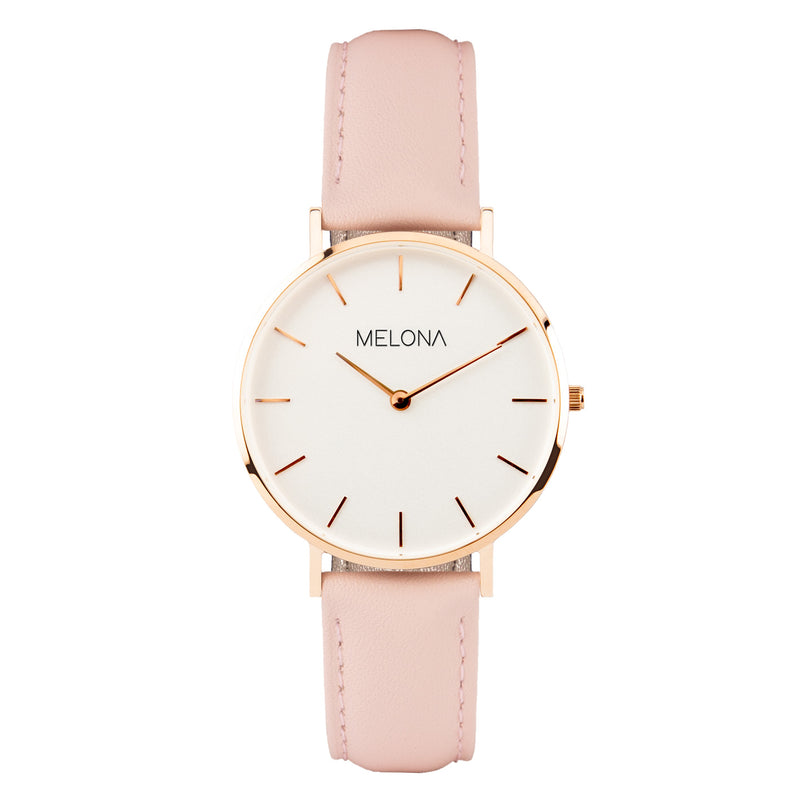 Delicado reloj de mujer con correa de cuero genuino rosa, esfera blanca y detalles dorados de la marca de joyería española Melona de colección Mandala Touch