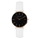 Reloj minimalista de mujer con correa blanca de cuero genuino y esfera negra de la marca de relojes española Melona de colección Mandala Touch