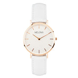 Reloj minimalista blanco de mujer con correa de cuero genuino y detalles dorados de la marca de relojes española Melona de colección Mandala Touch