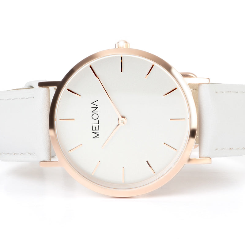 Reloj minimalista blanco de mujer con correa de cuero genuino y detalles dorados de la marca de relojes española Melona de colección Mandala Touch