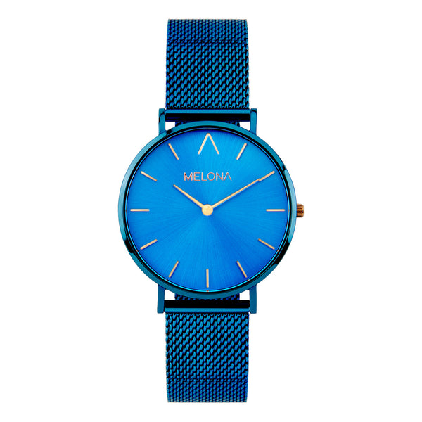 Hermoso reloj de mujer con correa de malla azul y detalles dorados de la marca de joyería española Melona