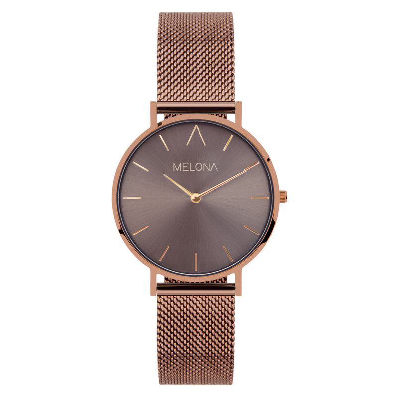 Reloj minimalista de mujer con correa de malla bronce y esfera bronce de la marca de joyería española Melona