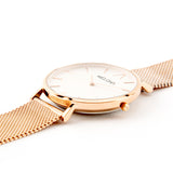 Reloj minimalista de mujer con correa de malla oro rosa y esfera blanca de la marca de joyería española Melona